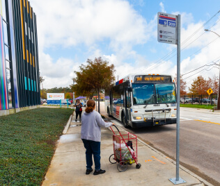 17576-Gulfton-Circulator The 309 Gulfton Circulator local bus approaches a stop in the Gulfton area.