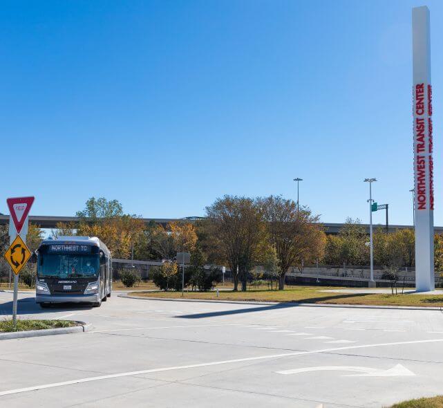 METRORapid vehicle pulling in to Northwest Transit Center