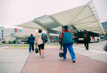 Customers arriving at TMC Transit Center