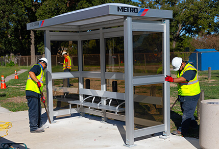 13274-Accessible-Bus-Shelter-Installation Crew members installing a METRO bus shelter.