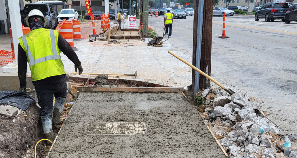 Concrete has been poured onto sidewalk.
