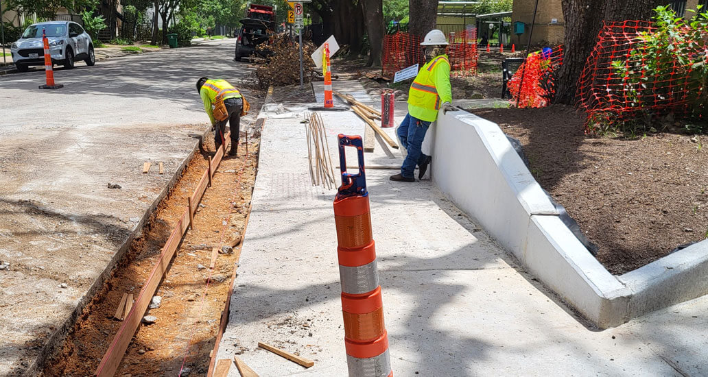 Completed sidewalk and retaining wall at Yaupon St. in front of Ella Baker Montessori school.