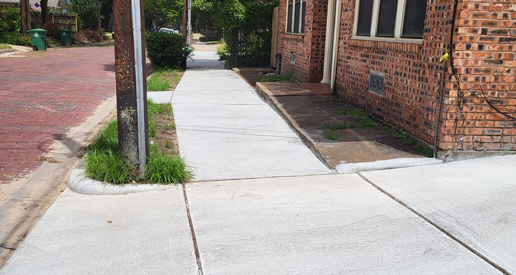 Completed sidewalk and driveway at Michigan St.