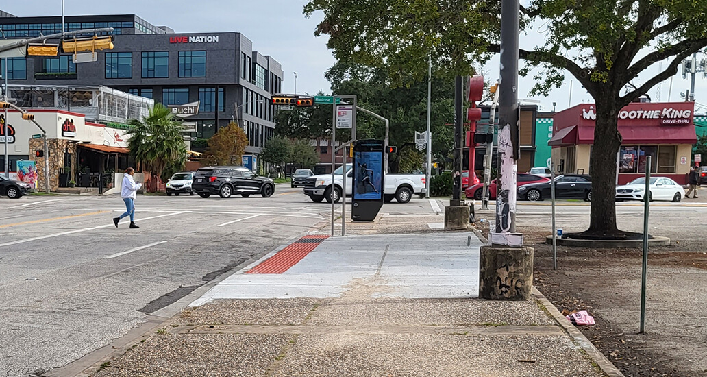 New concrete bus pad  with a tree shading it