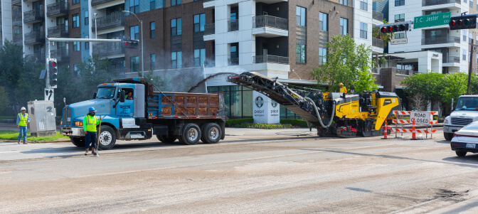 METRO construction crews repairing streets along Washington Avenue and T C Jester.