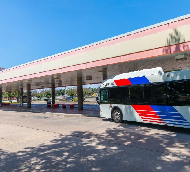 5283-Tidwell-Transit-Center Customer exiting METRORapid vehicle