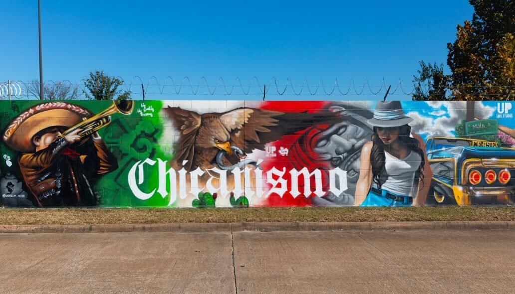 Mural promoting Chicanismo along the outer wall of the Kashmere bus operating facility at 5700 Eastex Freeway in Houston