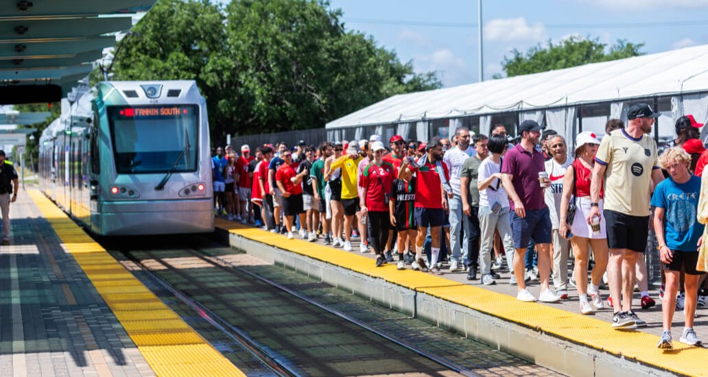 Crowd walking after they exit train at Stadium Park/Astrodome.