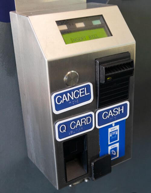 Fare card reload machine found near the rear exit door on METRO local buses.