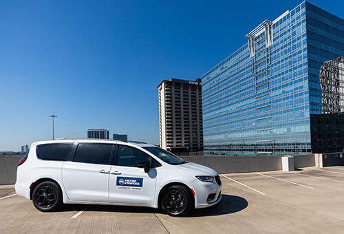 METRO Vanpool  van parked near Downtown Houston.