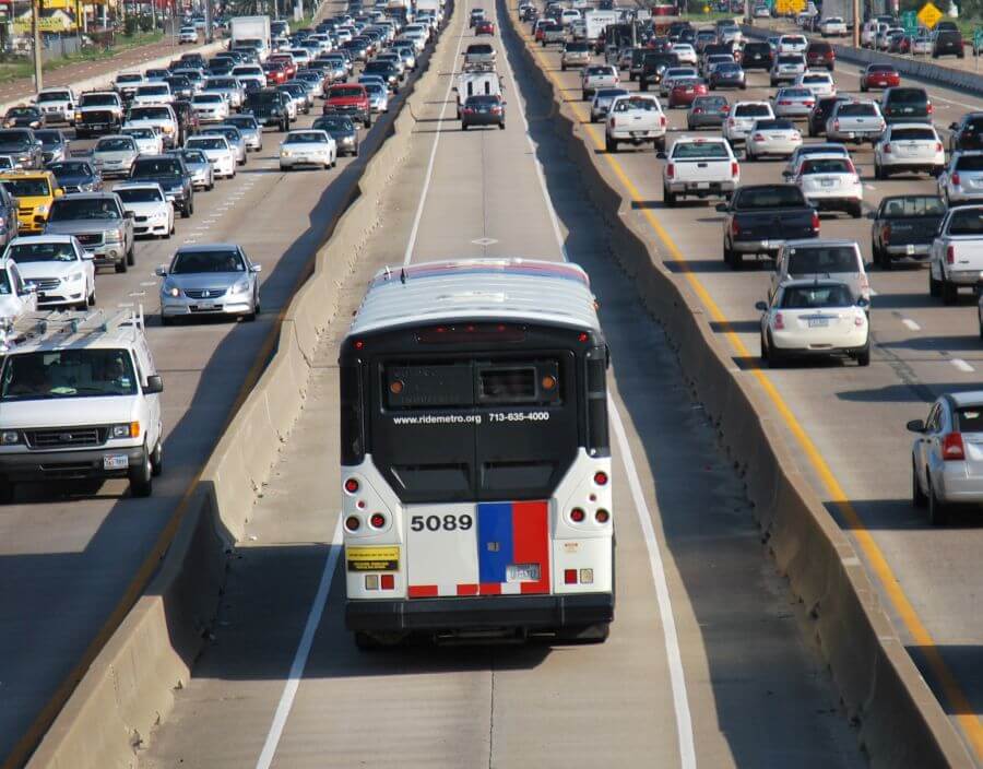 METRO Park & Ride bus traveling in HOV lane on Interstate 45 South with gridlock traffic in both directions.