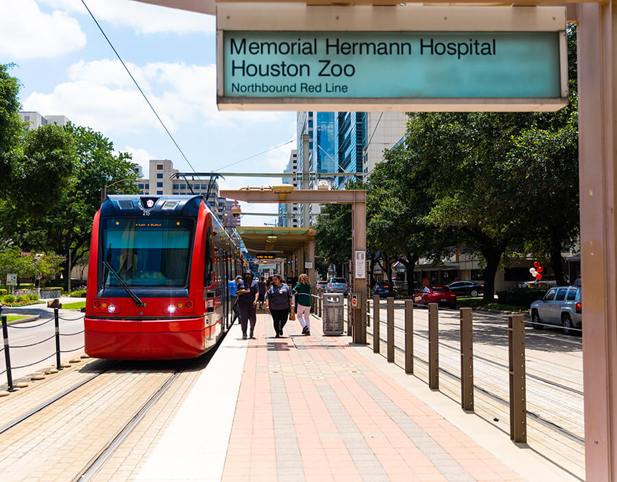 METRORail Red Line pulling away from the Memorial Hermann Hospital / Houston Zoo station