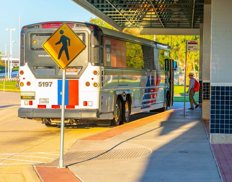 Customer boarding METRO bus at a Park & Ride facility