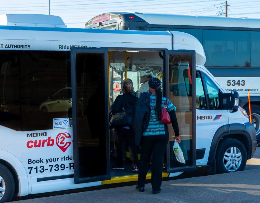 Customers boarding METRO curb2curb shuttle