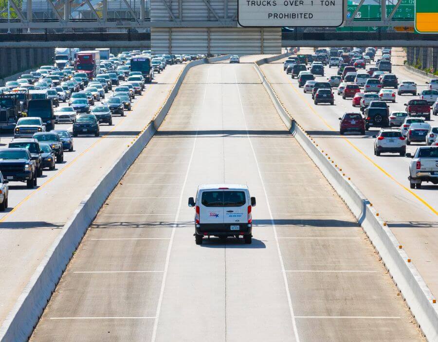 METRO STAR Vanpool vehicle in HOV lane on U.S. Highway 59 South.