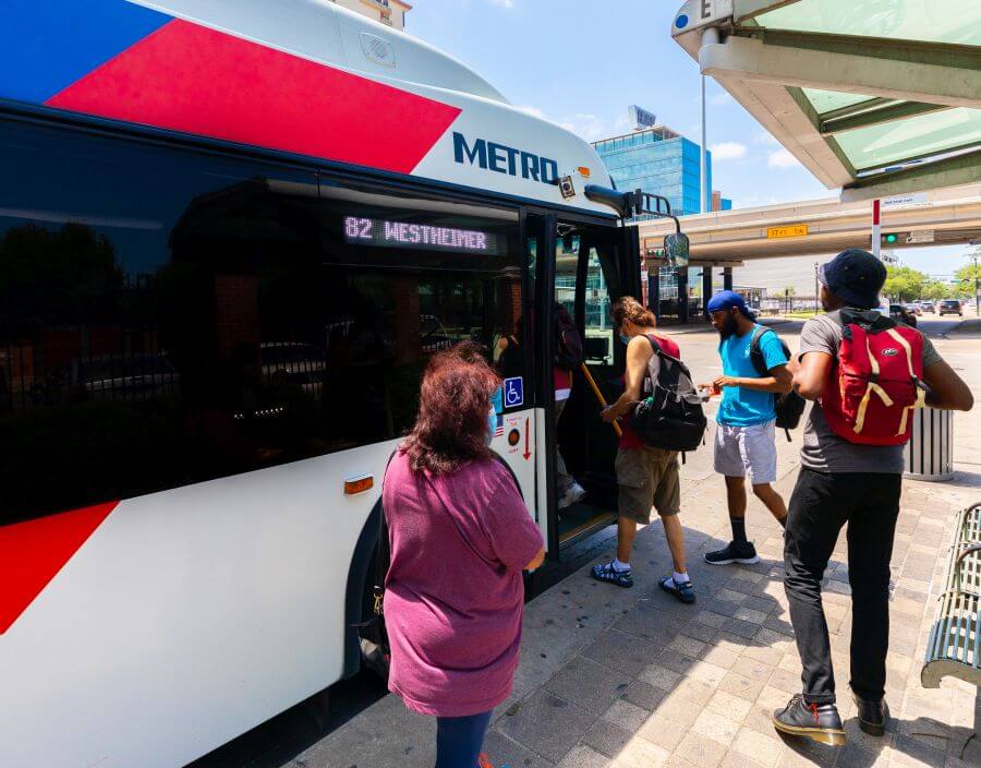 Customers boarding 82 Westheimer bus in downtown Houston