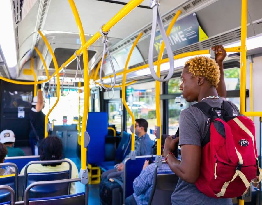 Student riding the METRO local bus