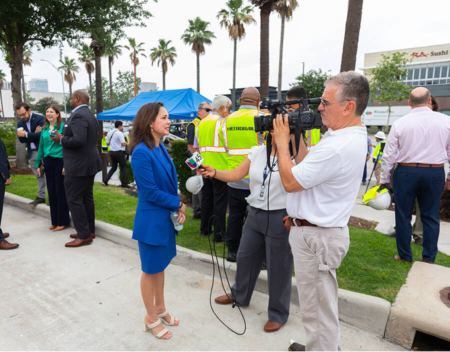 METRO Chairwoman Elizabeth Brock speaks to the press at a BOOST 82 Westheimer groundbreaking event.