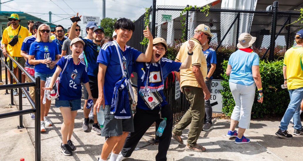 Excited fans exiting the train at Stadium Park / Astrodome station.