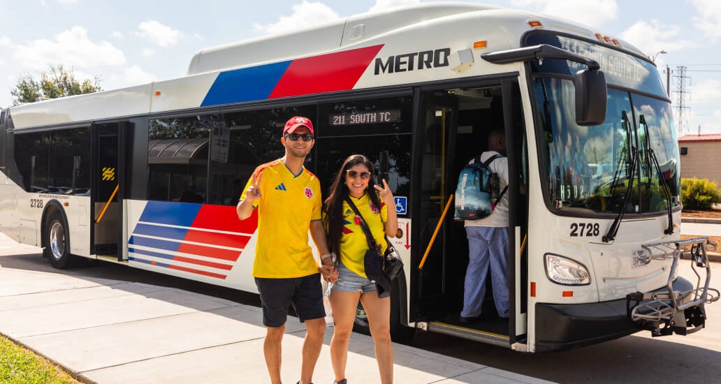 Riders exit METRO bus at Fannin South Transit Center.