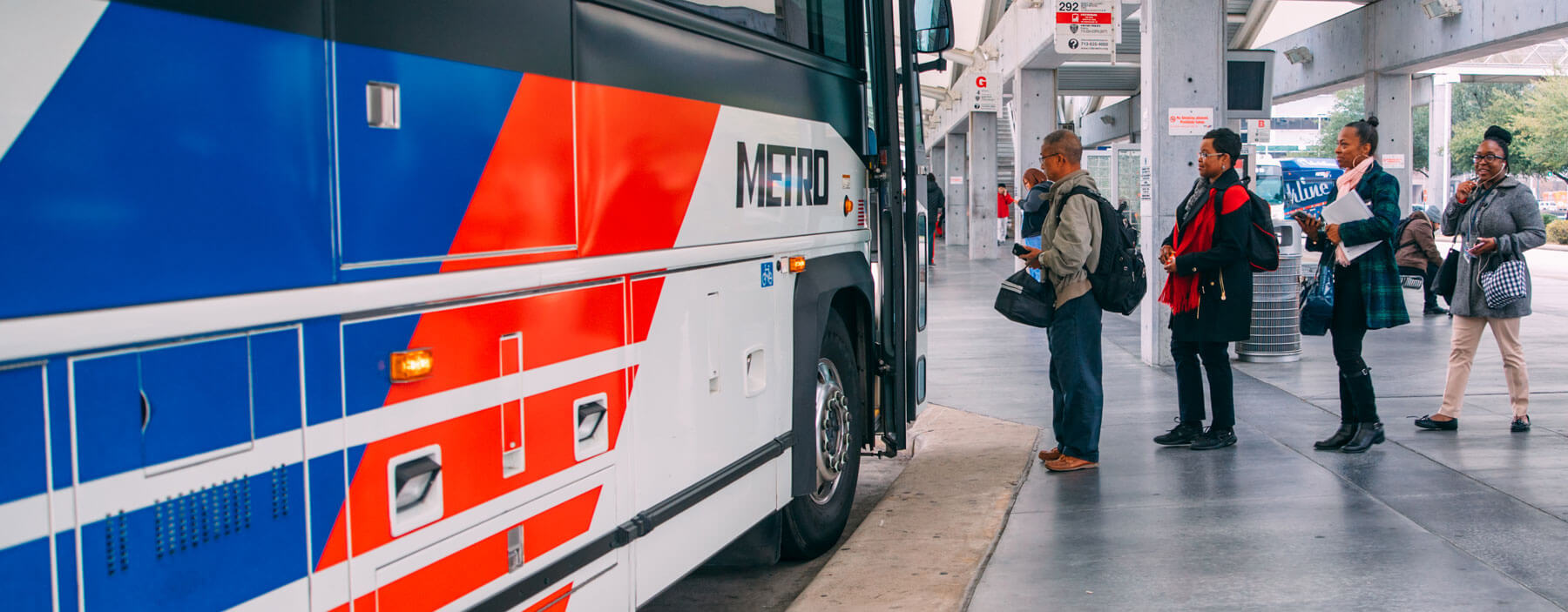 METRO riders boarding a park & ride bus at a transit center.