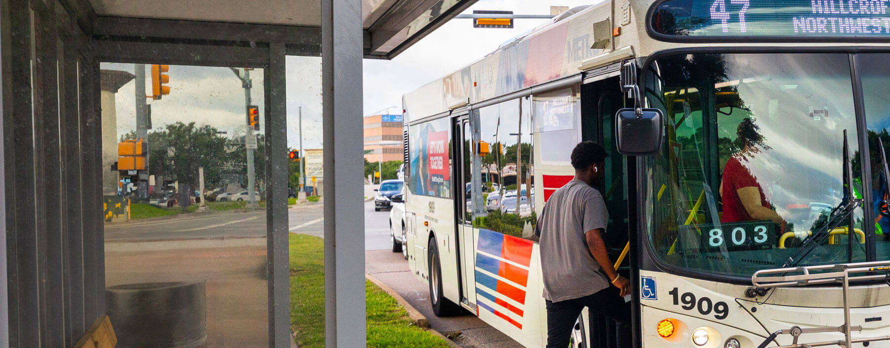 Rider boarding a local bus.