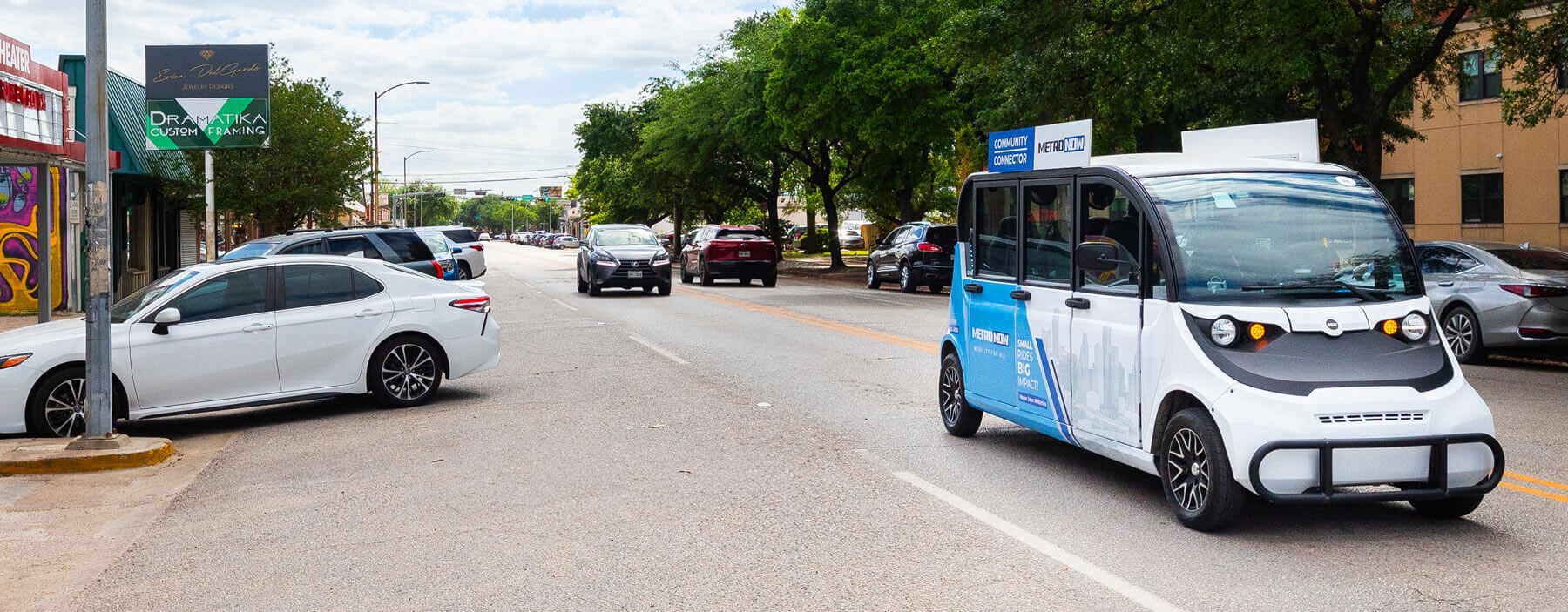 A METRO Community Connector vehicle passing through the Heights neighborhood.
