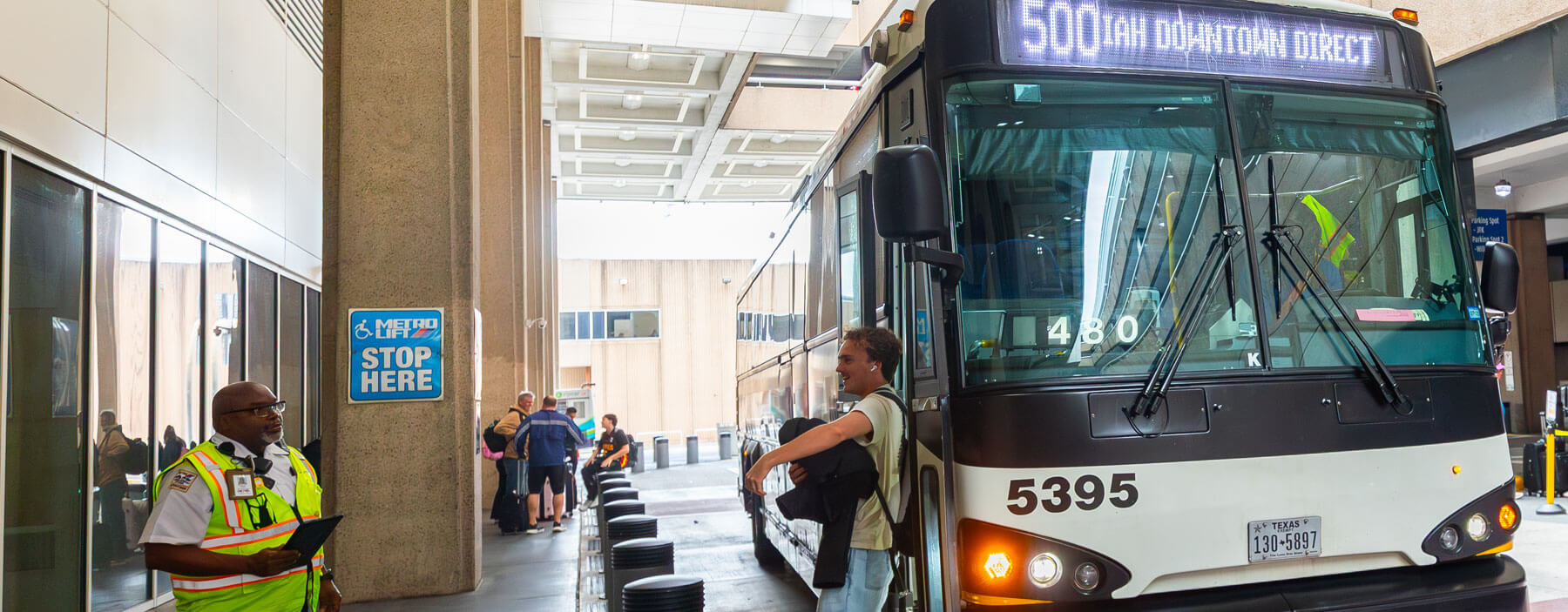 Rider getting off the 500 IAH Downtown Direct at the George Bush Intercontinental Airport (IAH).