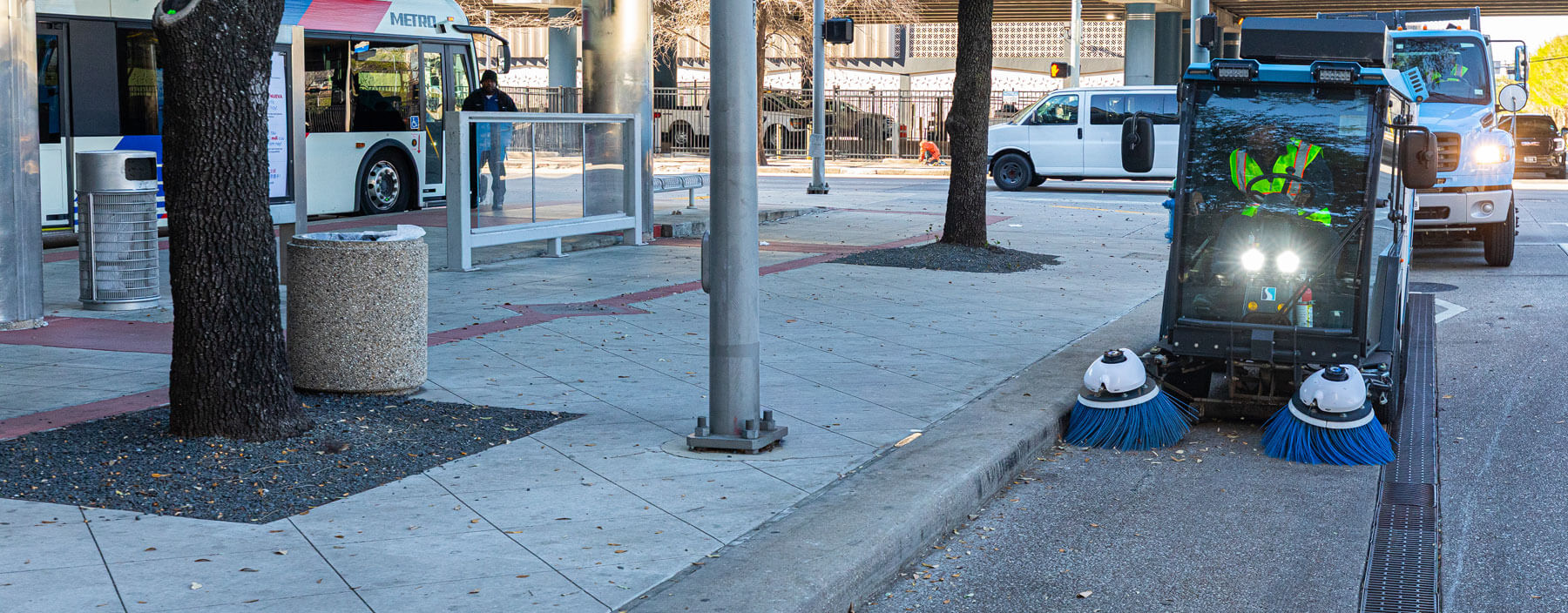 Street sweeper cleaning at a METRO Transit Center.