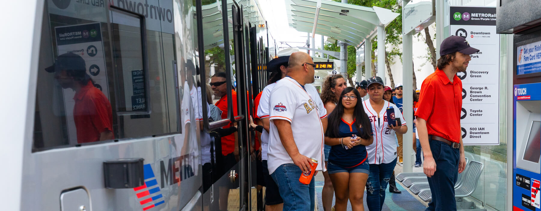 Crowd of Astros fans leaving METRORail train