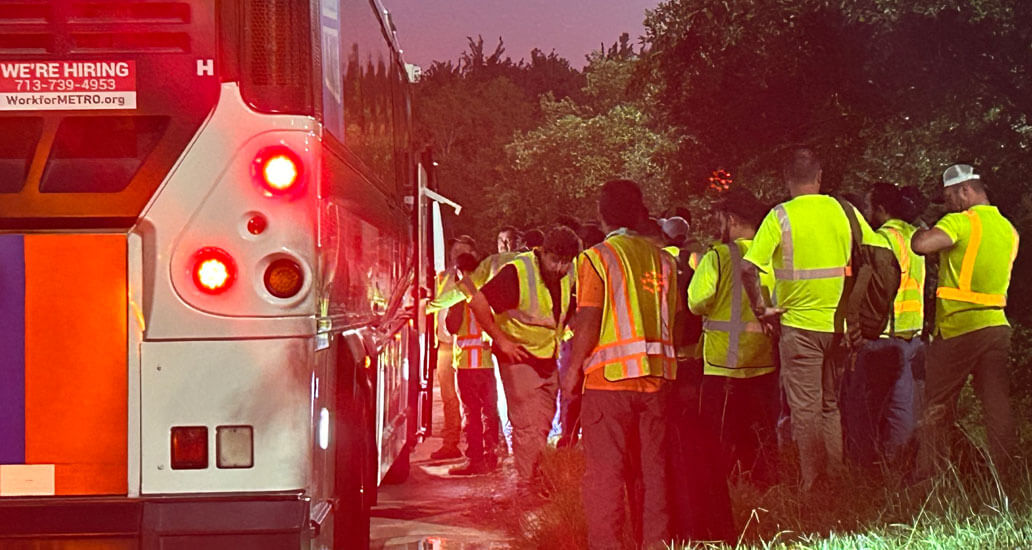 Crews boarding METRO bus.