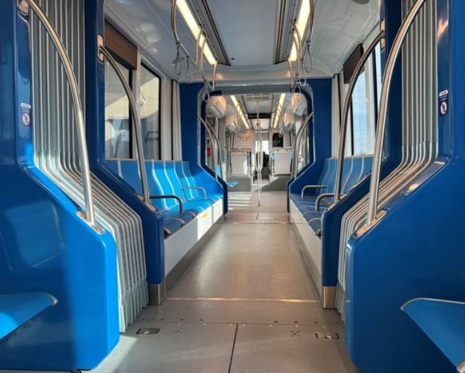 Interior of a new METRO H4 train featuring open seating layout.