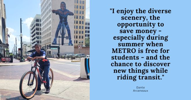 Dante Arceneaux poses in front of a downtown mural of a boy and his bike.