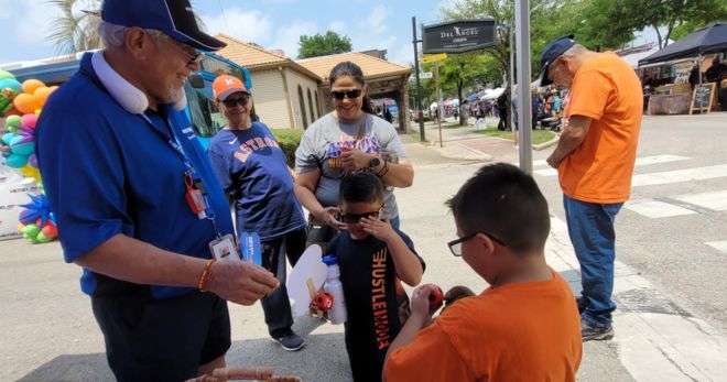 METRO staff chat with kids at the East End Street Fest.