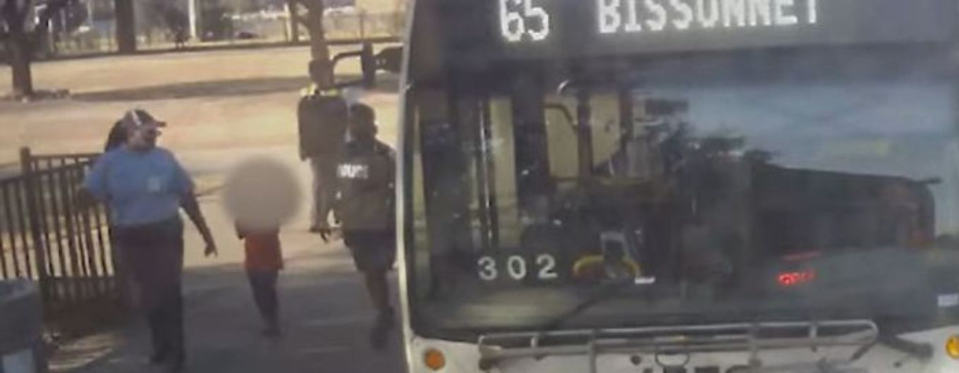 A lost young girl is escorted to a waiting METRO bus by an MPD Officer and METRO Bus Operator.