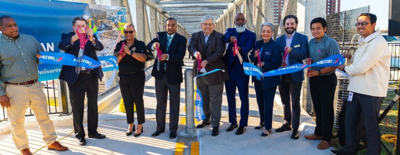 METRO staff and community leaders cut the ribbon on new bridge.