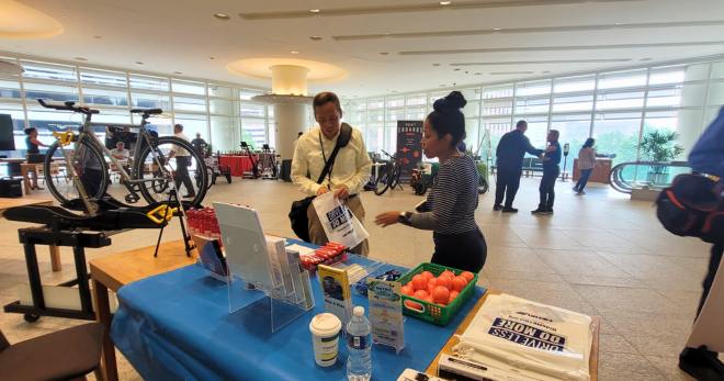 METRO employee speaks with a Chevron commuter.