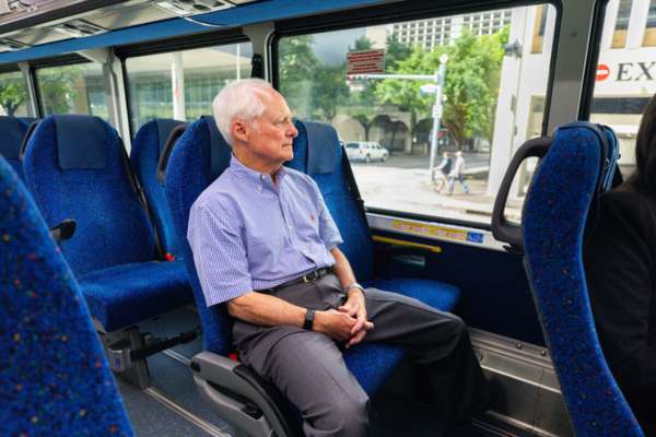 METRO Board Member Mayor Fry enjoys the view as he rides the bus.