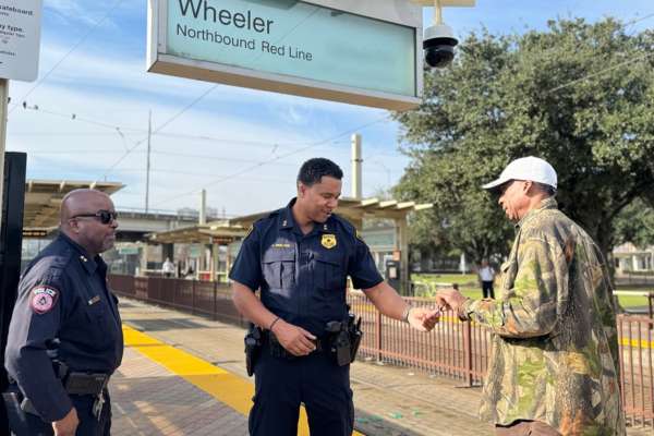 METRO PD and Houston PD officers ride the METRORail to increase police presence.