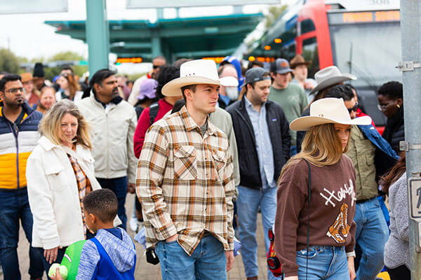 Rodeo attendees ride the METRORail to go to the NRG Park for the annual Houston Rodeo.