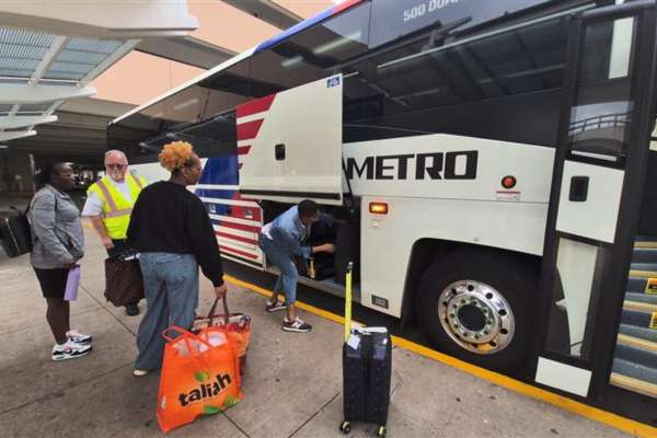Passengers onboard the Downtown Direct 500 at Hobby Airport.