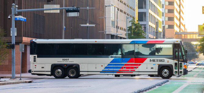 METRO Park & Ride commuter express bus traveling through downtown Houston.