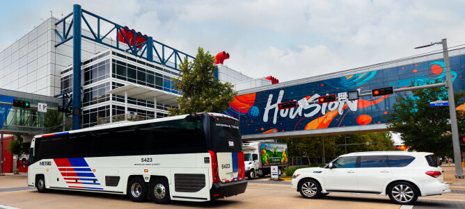 Local bus on the 500 IAH Downtown Direct bus route arriving at George R. Brown Convention Center.