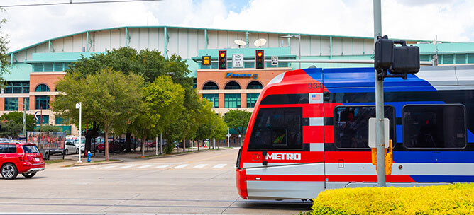 METRORail traveling past Daikin Park.