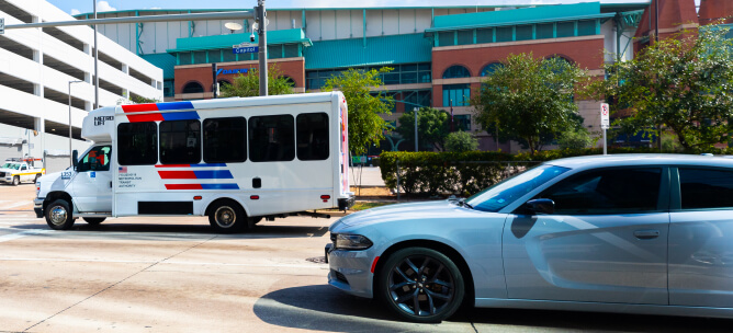 METROLift vehicle driving near Daikin Park.