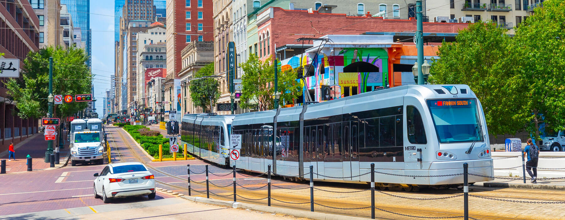 METRORail vehicle traveling through downtown.