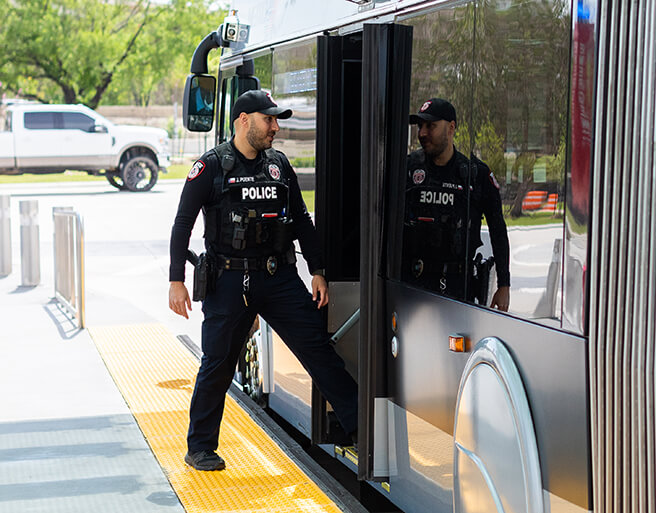METRO police officer checking METRO vehicle