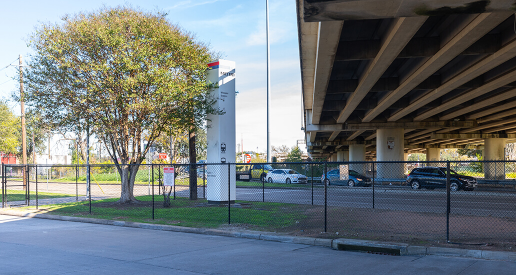 Signage at Wheeler Transit Center in front of added fencing.