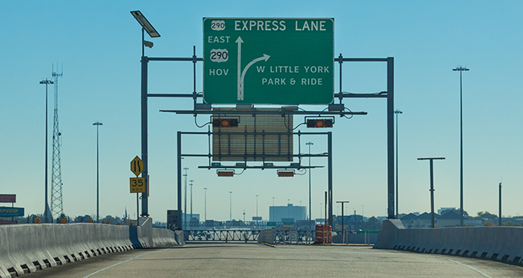 Highway 290 NW Express Lane exit sign at West Little York Park & Ride