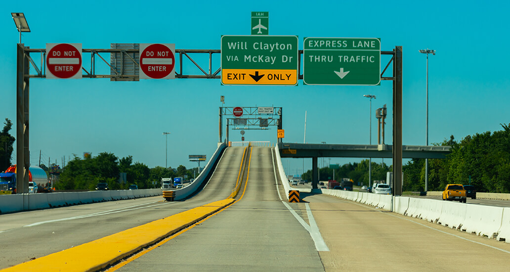 59 North Freeway express lane exit towards Will Clayton Parkway.